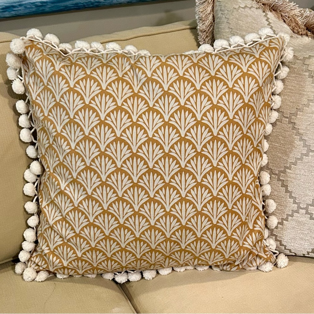 Pottery Barn pillow pair, honey yellow design with custom added pom-pom trim